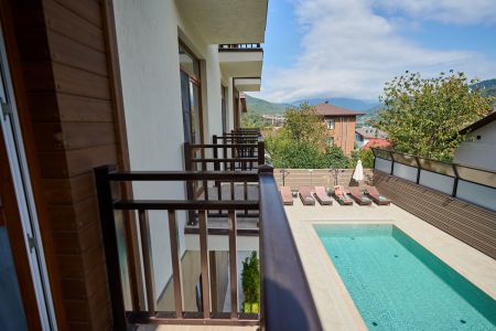 Апартаменты 4-местные Улучшенные (с балконом)