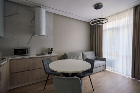 Апартаменты 4-местные Улучшенные (с балконом)