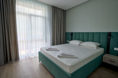 Апартаменты 4-местные Улучшенные (с балконом)