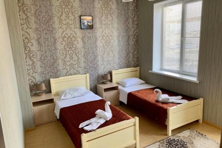 Апартаменты 4-местный 3-этажный (с 2 спальнями)