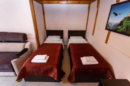 Апартаменты 4-местный 3-этажный (с 2 спальнями)