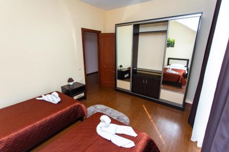 Апартаменты 4-местный 3-этажный (с 2 спальнями)