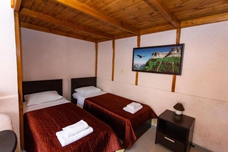 Апартаменты 4-местный 3-этажный (с 2 спальнями)