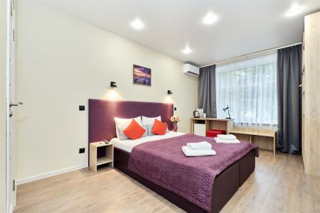 Улучшенный номер с 1 большой  или 2 раздельными кроватями