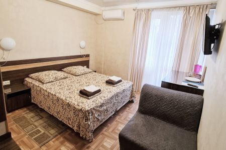 Стандарт Стандартный                         2-местный номер с дополнительным местом и балконом