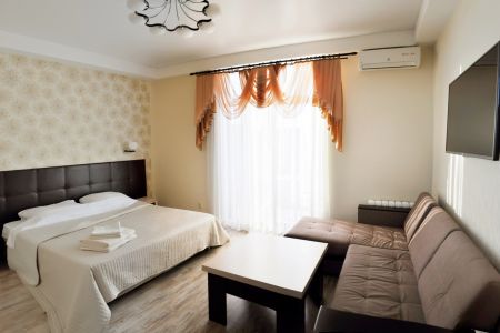 Люкс с балконом 4-местный 1-комнатный