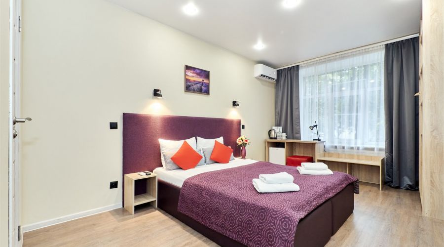 Улучшенный номер с 1 большой  или 2 раздельными кроватями