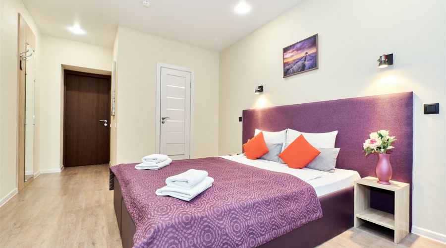 Улучшенный номер с 1 большой  или 2 раздельными кроватями