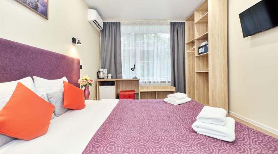 Улучшенный номер с 1 большой  или 2 раздельными кроватями