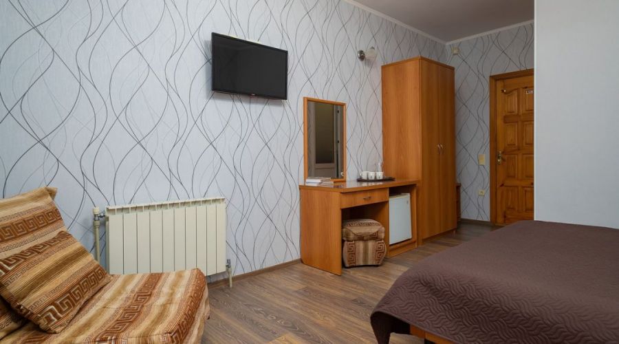 Стандарт Четырехместный с балконом и видом на море (два кресла)