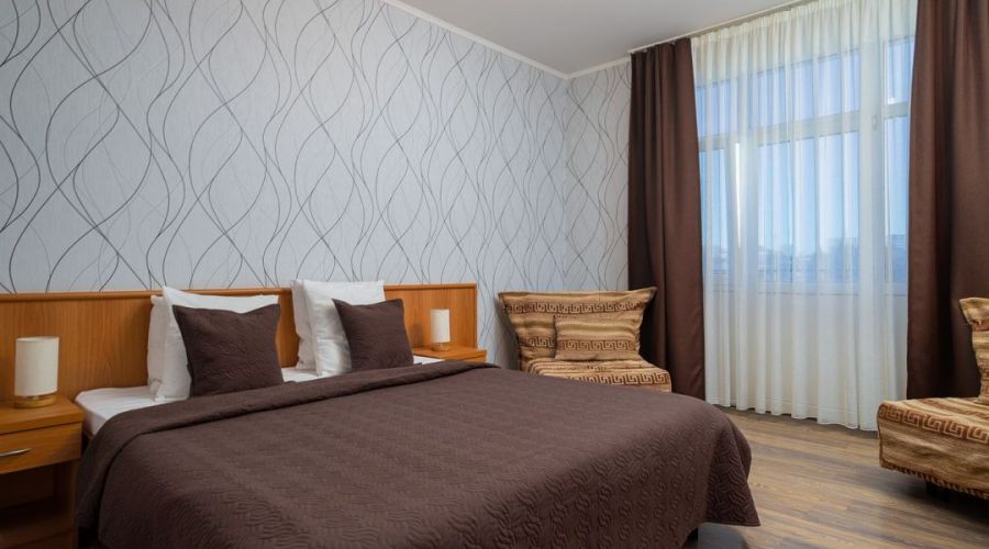 Стандарт Четырехместный с балконом и видом на море (два кресла)