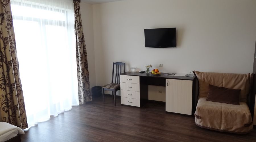 Делюкс 4-местный 1-комнатный с балконом 