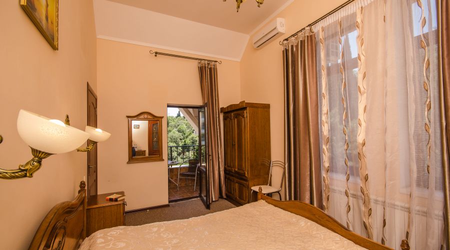 Улучшенный 2-местный 1-комнатный боковой вид на море №10