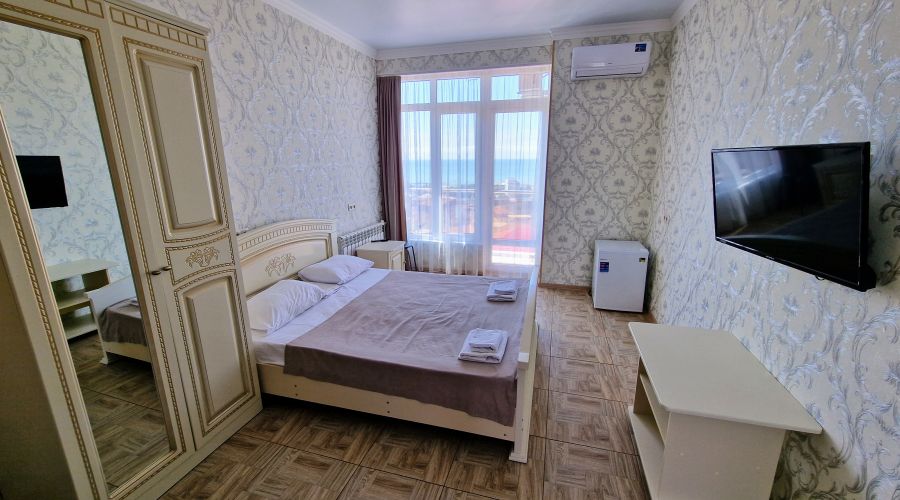 Делюкс 4-местный 1-комнатный с балконом и видом на море