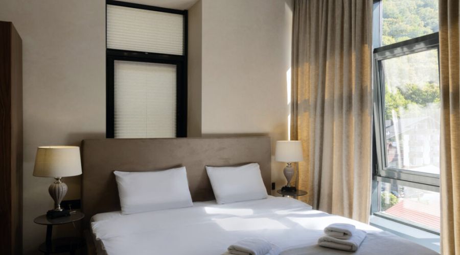 Апартаменты 4-местный Делюкс