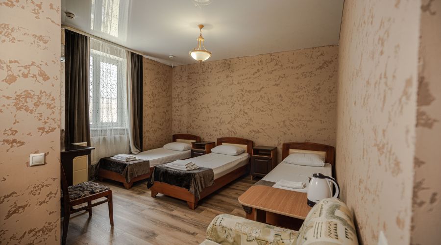 Номер 3-местный с 3 -мя односпальными кроватями