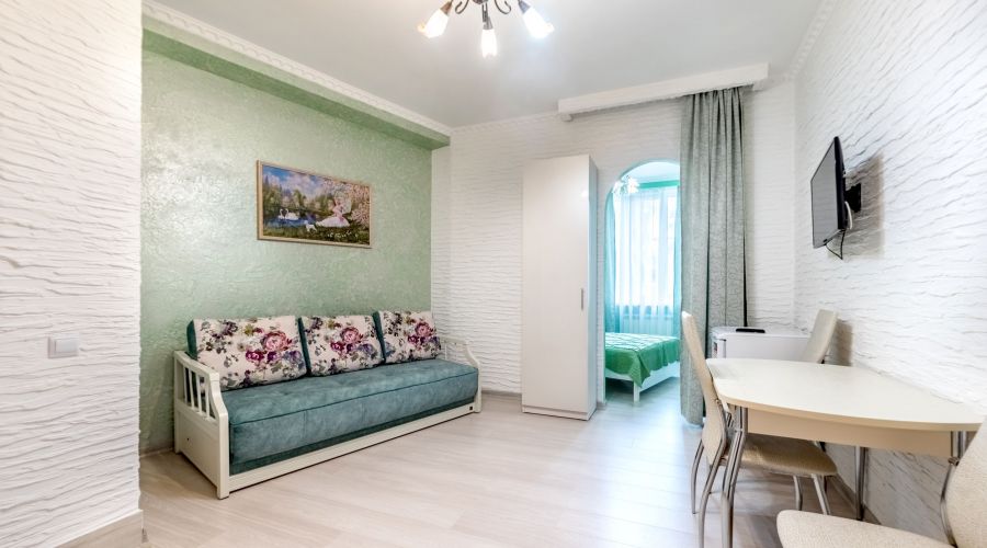 Апартаменты 4-местные Делюкс с балконом