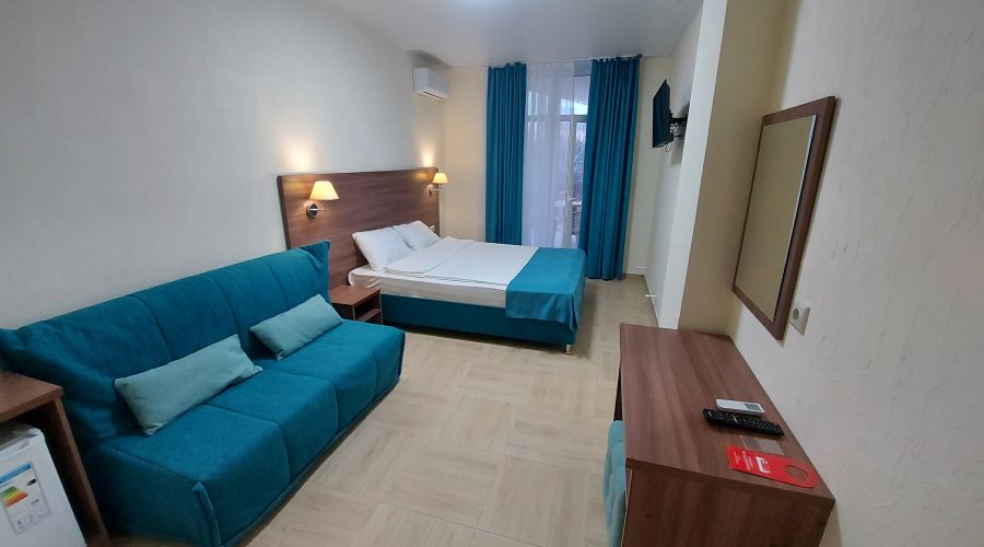 Делюкс Делюкс 4-местный с балконом 