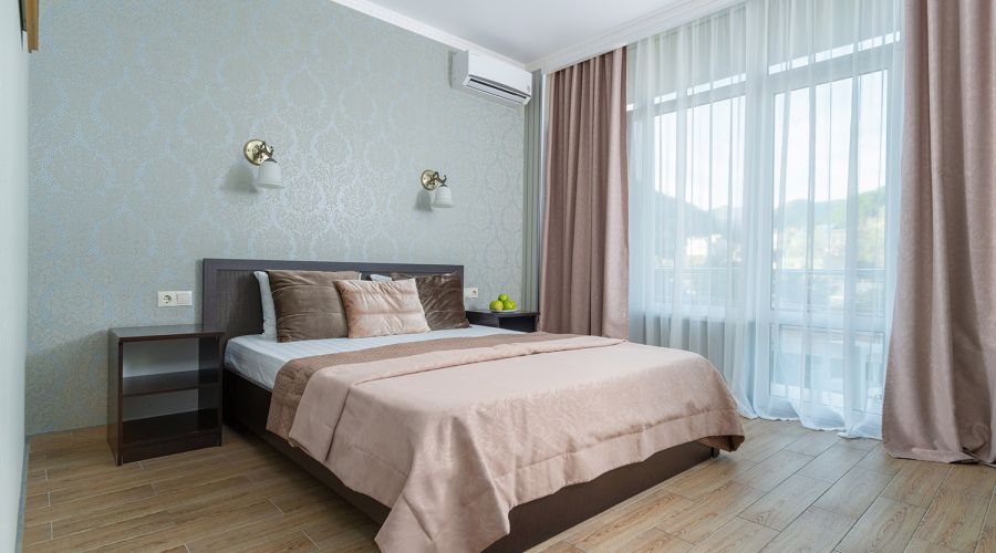 Делюкс Делюкс 4-местный с балконом и видом на горы 