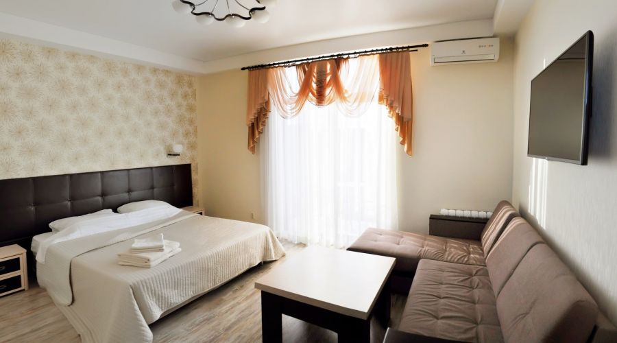 Люкс с балконом 4-местный 1-комнатный